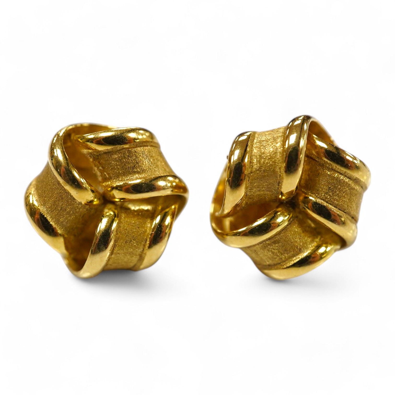 A pair of 18ct yellow gold stud earrings of knotted design with a textured finish, 1.1cm diameter each, post fittings, British hallmarks, gross weight 3.5 grams